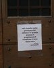 Jonathan Siegel (JSBird) > The sign on the bar door loosely translates as "out of respect for those who live in this plaza, please moderate the tone of your voice". Didn't work.