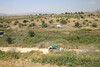 Jonathan Siegel (JSBird) > Modern fortifications: Until 1967 (when this land was captured), the Syrian patrol road was where this car drives. The Syrians and Israelis skirmished over the spring source, just out of sight to the left.
