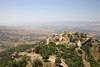 Jonathan Siegel (JSBird) > The view from the main Keep. In foreground, rest of castle. Facing west, in the distance are the hills with the Lebanese border at the top ridge. In the left middle, the elevated Golan Heights, captured by Israel in '67. In the valley between, the Hula valley of Israel, where "my" kibbutz is.