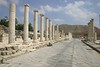 Jonathan Siegel (JSBird) > The reconstructed main drag. In the background, the ancient "tel" (dozens of layers of cities built on over the other) was ancient even to the Romans