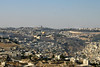 Jonathan Siegel (JSBird) > A view of Jerusalem to the north, with the Dome of the Rock in the center. The old city walls are seen, and the surrounding "new" city dwarfs the old. Arab neighborhoods are in the foreground and the right; the other neighborhoods are mainly Jewish