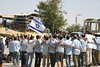 Jonathan Siegel (JSBird) > The plaza in front of the Western Wall is large, with a swirling changing show of people dancing, praying, taking pictures, gawking and people watching. These boys from a yeshiva (Jewish bible students) dance