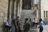 Jonathan Siegel (JSBird) > Outside, a symbol of Jerusalem: The police (in blue shirts) include a Jew, a Muslim and a Christian. The more heavily laden ones in green are the Border Police