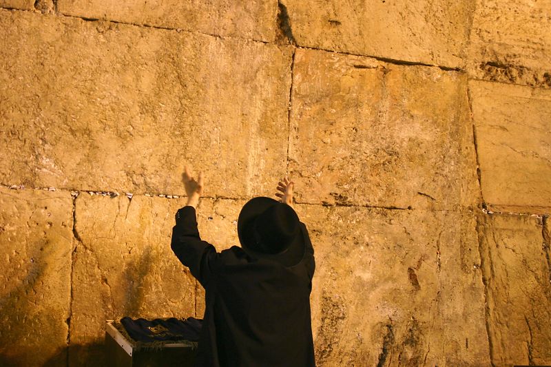 Jonathan Siegel (JSBird) > Our last day. Back to the Western Wall again. A man raises his arms in supplication and prayer