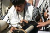Jonathan Siegel (JSBird) > A  13 year old boy reads from the Torah, part of the tradition of becoming a Bar Mitzvah